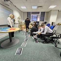 Student-activity-with-sheets.jpg